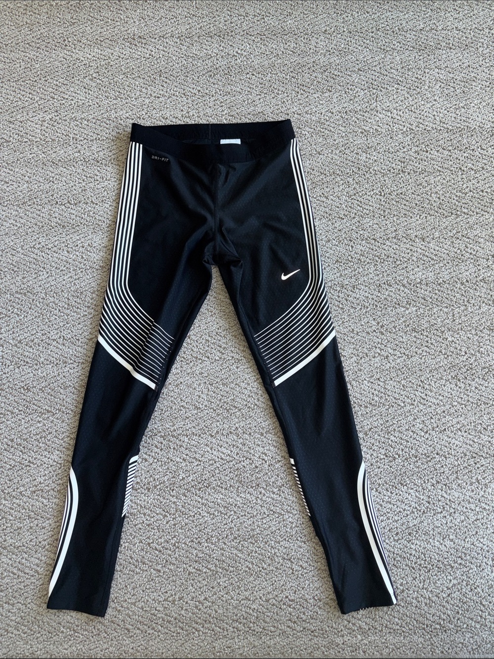 Nike Black Leggings with White Stripe Accents